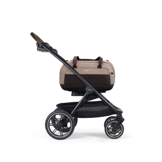 A Dupree II Pet Car Seat, in fawn, and attached to the Roscoe Trek 2.0 Pet Stroller Frame from a side profile.