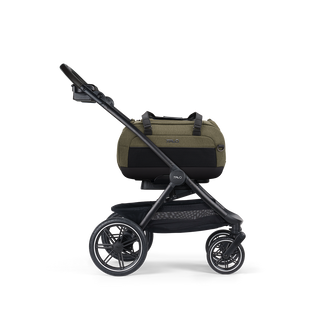 A Dupree II Pet Car Seat, in fern, and attached to the Roscoe Trek 2.0 Pet Stroller Frame from a side profile.