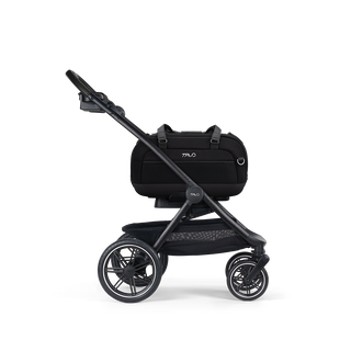 A Dupree II Pet Car Seat, in onyx, and attached to the Roscoe Trek 2.0 Pet Stroller Frame from a side profile.