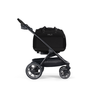A Hendrickx Pet Car Seat, in onyx, and attached to the Roscoe Trek 2.0 Pet Stroller Frame from a side profile.