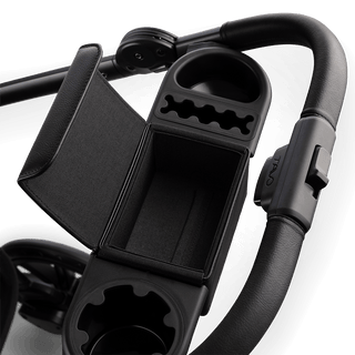 A Roscoe Trek 2.0 Pet Stroller frame in black showing its organizer bar open.