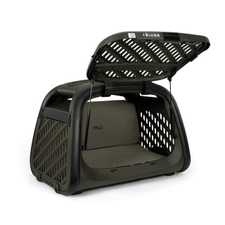 The Everett L crash-tested pet cargo crate from a side angle with the front door open.