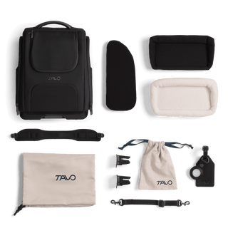 A Kamella Pet Backpack and Car Seat, in onyx, showing all of the items that come in the box.