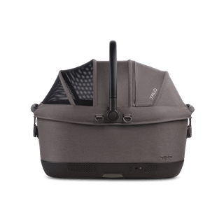 A Maeve iso 6x Wind Pet Car Seat in the fashion ashen from the side with the canopy closed