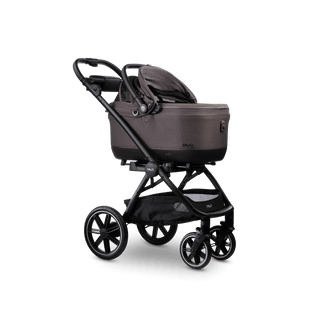A Maeve iso 6x Wind travel system in the fashion ashen with the right side of the car seat canopy open 