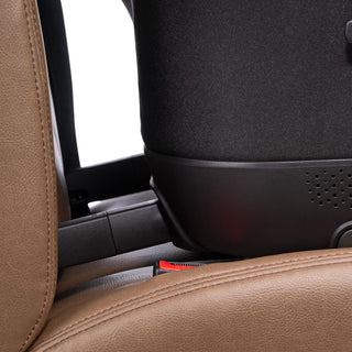 A close up image of the Maeve iso ISOFIX latches  attached to the vehicle anchor points of a car seat bench.