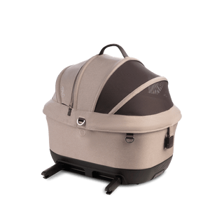 A Maeve iso 5x Wind Pet Car Seat in the fashion fawn from the side with the canopy closed