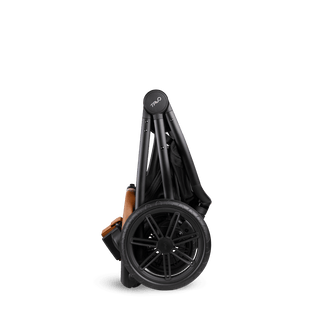 A cognac Roscoe Trek  Pet Stroller Frame shown standing folded up  - view 2