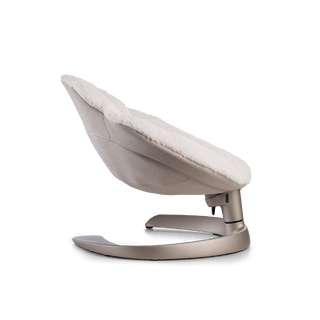 Side view of a white plush pet bed with gray underside on a brushed bronze c-shaped frame sitting at the highest, upright angle