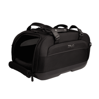 open three-quarter view of black pet car seat with unzipped mesh side door and two carry handles at the top - view 2