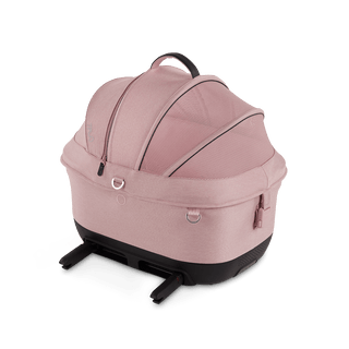 Maeve iso5x pet car seat in the sakura fashion shown from the side with its integrated ISOFIX latches out 
