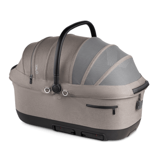A Maeve iso 7x-R Pet Car Seat in the fashion merle on an angle with the ISOFIX latches out