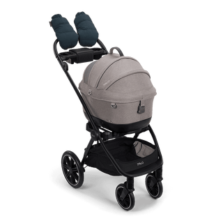 Tavo Pets winter gloves in the fashion teal shown attached to the handle bar of the Roscoe Trek Stroller Frame