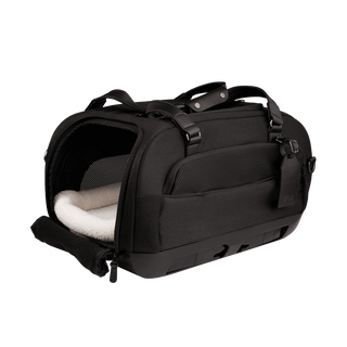 open three-quarter view of black pet car seat with unzipped mesh side door and white comfort liner inserted with two carry handles at the top - view 3