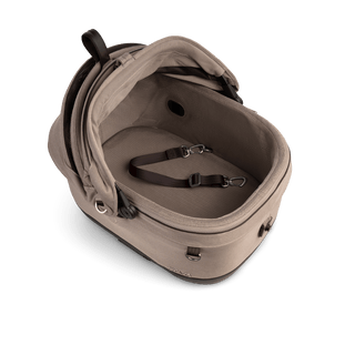 A Maeve iso 5x Wind Pet Car Seat in the fashion fawn on an angle showing the mesh liner