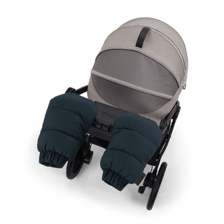 Tavo Pets winter gloves in the fashion teal shown attached to the handle bar of the Roscoe Trek Stroller Frame