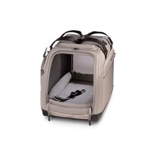 An tawny fashion Hendrick Pet Car Seat with a side door rolled open showing a durable mattress and an interior leash