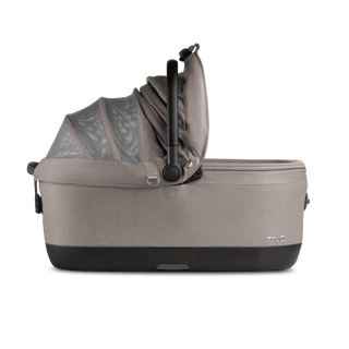 A Maeve iso 7x Pet Car Seat in the fashion merle from the side with the right side of the canopy open