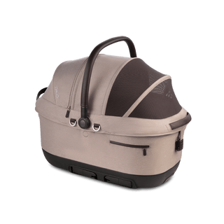 A Maeve iso 6x Wind Pet Car Seat in the fashion fawn on an angle showing the mesh liner