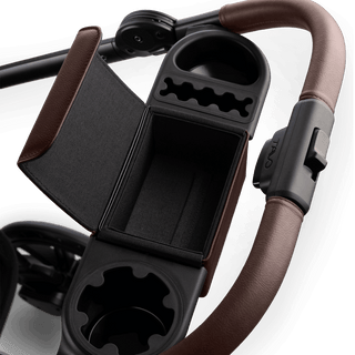 The organizer bar of a chocolate Roscoe Trek  Pet Stroller Frame with the treat compartment open - view 5