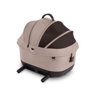 Maeve iso5x pet car seat in the fawn fashion shown from the side with its integrated ISOFIX latches out.