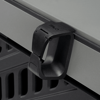 a close up of the leash clasp attached to the Everett accessory dock