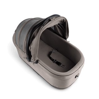 A Maeve iso 7x Pet Car Seat in the fashion merle on an angle showing the durable liner