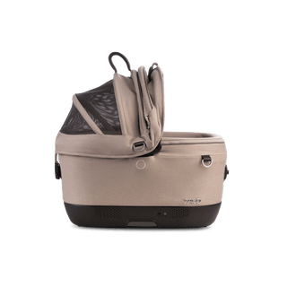 A Maeve iso 5x Wind Pet Car Seat in the fashion fawn from the side with the right side of the canopy open