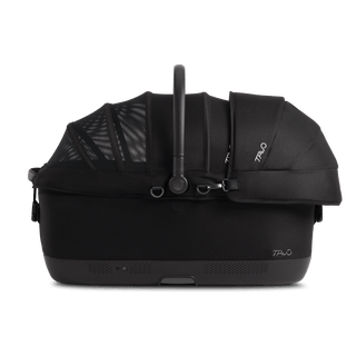 Maeve iso7x Wind pet car seat in the onyx fashion shown from the front with its Side Impact Protection Guard attached.