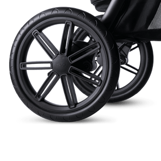 A close up of a black Roscoe Trek  Pet Stroller Frame wheel - view 6