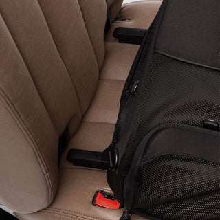 Close up view of ISOFIX latches aimed for the vehicle's rigid latch anchor bars on a brown vehicle seat - view 6