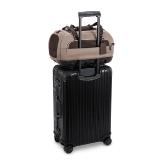 Dupree II pet car seat in the fawn fashion shown on top of luggage using the trolley sleeve - view 6