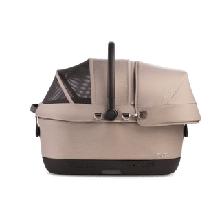 A Maeve iso 6x Wind Pet Car Seat in the fashion fawn from the side with the canopy closed and the SIP on