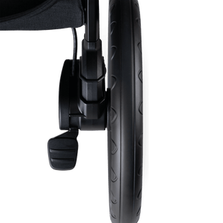 A close up of a chocolate Roscoe Trek  Pet Stroller Frame wheel brake - view 7