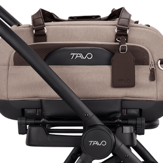 A close up of the Dupree II pet car seat in the fawn fashion attached to the Dupree adaptor on the Roscoe Stroller Frame