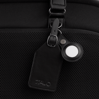 included luggage tag and airtag tracking device holder