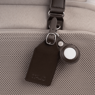 included luggage tag and airtag tracking device holder on gray pet car seat