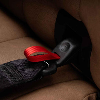 Push-on connectors with red release loops, secured to the vehicle's lower anchors