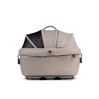 side view of beige small pet car seat with canopy closed, fawn