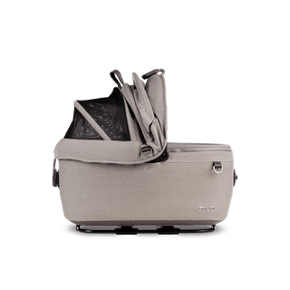 side view of beige small pet car seat with right side of canopy open, fawn