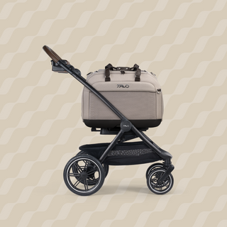 A Hendrick  Pet Car Seat, in tawny, and attached to the Roscoe Trek 2.0 Pet Stroller Frame from a side profile.