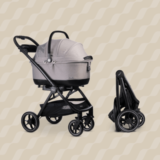 A Maeve iso 5x pet car seat in fashion Merle seated on top of a Roscoe stroller frame and next to a folded frame