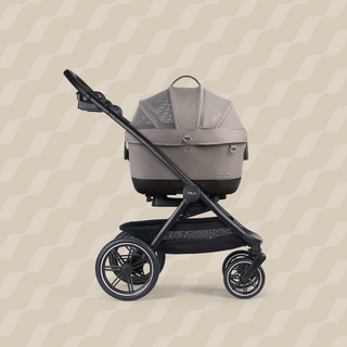 A Maeve iso Wind 6x Pet Car Seat closed and attached to the Roscoe Trek 2.0 Pet Stroller Frame from a side profile