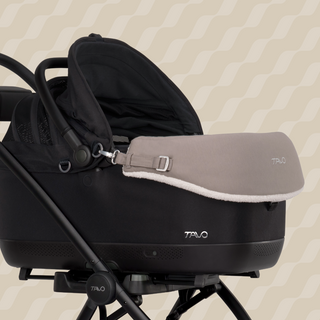 The maeve series reversible chin rest attached to the maeve travel system showing a close up of the jersey side
