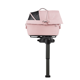 side view of pink small pet car seat on base with extended load leg and side impact protection, sakura