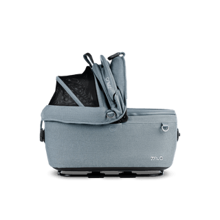 side view of blue small pet car seat with right side of canopy open, skye