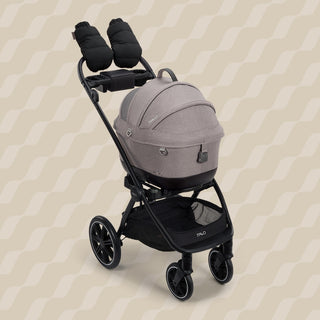 Tavo Pets winter gloves in the fashion onyx shown attached to the handle bar of the Roscoe Trek Stroller Frame